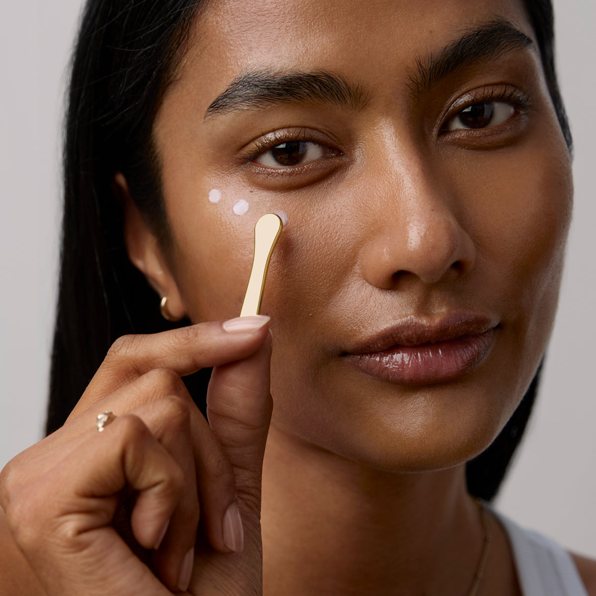 BrighteningEyeCream-Aug26-Ppage-ModelApplication.jpg