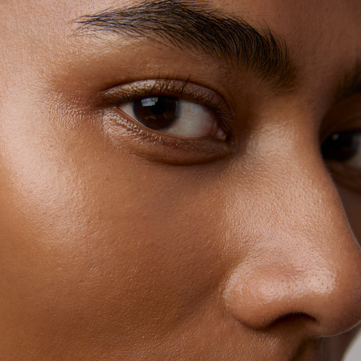 BrighteningEyeCream-Aug26-Ppage-ModelSkinFinish.jpg